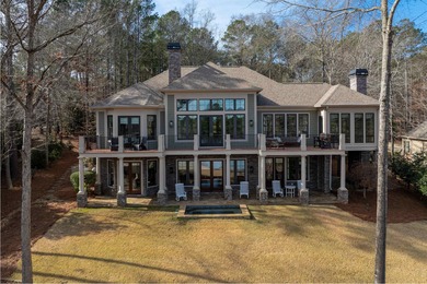 Welcome to an exceptional custom lake-view home where luxury on Reynolds Lake Oconee - The Oconee in Georgia - for sale on GolfHomes.com, golf home, golf lot