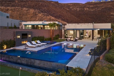 Perched on a quiet cul-de-sac in prestigious guard-gated on Dragon Ridge Country Club in Nevada - for sale on GolfHomes.com, golf home, golf lot