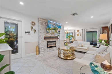 Welcome to your private oasis in the highly sought-after Country on Country Club of Miami in Florida - for sale on GolfHomes.com, golf home, golf lot