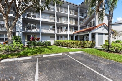Beautiful first-floor unit featuring tile flooring throughout on Flamingo Lakes Country Club in Florida - for sale on GolfHomes.com, golf home, golf lot