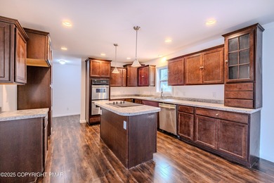 PRICE REDUCED...Welcome to your Pocono retreat! This stunning on Pocono Farms Country Club in Pennsylvania - for sale on GolfHomes.com, golf home, golf lot