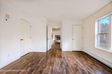 PRICE REDUCED...Welcome to your Pocono retreat! This stunning on Pocono Farms Country Club in Pennsylvania - for sale on GolfHomes.com, golf home, golf lot