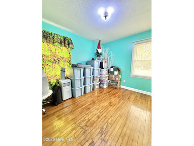 Located in unrestricted Arapahoe, this charming 3-bedroom on Minnesott Golf and Country Club in North Carolina - for sale on GolfHomes.com, golf home, golf lot