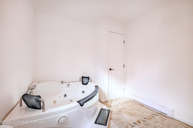 PRICE REDUCED...Welcome to your Pocono retreat! This stunning on Pocono Farms Country Club in Pennsylvania - for sale on GolfHomes.com, golf home, golf lot