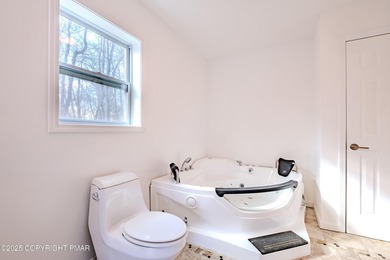 PRICE REDUCED...Welcome to your Pocono retreat! This stunning on Pocono Farms Country Club in Pennsylvania - for sale on GolfHomes.com, golf home, golf lot