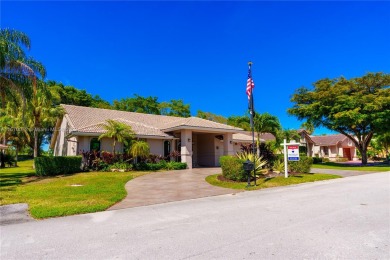 Beautifully upgraded Home in Tamarac! Great Home for on Woodmont Country Club in Florida - for sale on GolfHomes.com, golf home, golf lot