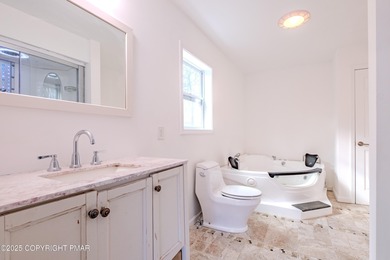 PRICE REDUCED...Welcome to your Pocono retreat! This stunning on Pocono Farms Country Club in Pennsylvania - for sale on GolfHomes.com, golf home, golf lot