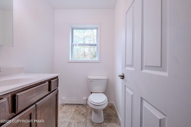 PRICE REDUCED...Welcome to your Pocono retreat! This stunning on Pocono Farms Country Club in Pennsylvania - for sale on GolfHomes.com, golf home, golf lot