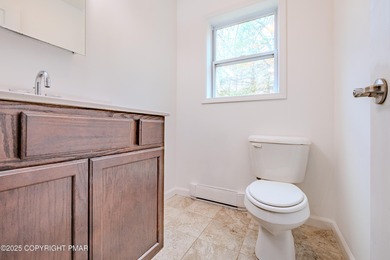 PRICE REDUCED...Welcome to your Pocono retreat! This stunning on Pocono Farms Country Club in Pennsylvania - for sale on GolfHomes.com, golf home, golf lot