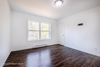 PRICE REDUCED...Welcome to your Pocono retreat! This stunning on Pocono Farms Country Club in Pennsylvania - for sale on GolfHomes.com, golf home, golf lot