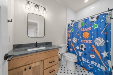 Experience luxury living in this beautiful two-story walkout on Willow Run Golf Course in South Dakota - for sale on GolfHomes.com, golf home, golf lot