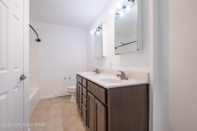 PRICE REDUCED...Welcome to your Pocono retreat! This stunning on Pocono Farms Country Club in Pennsylvania - for sale on GolfHomes.com, golf home, golf lot