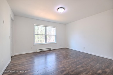 PRICE REDUCED...Welcome to your Pocono retreat! This stunning on Pocono Farms Country Club in Pennsylvania - for sale on GolfHomes.com, golf home, golf lot