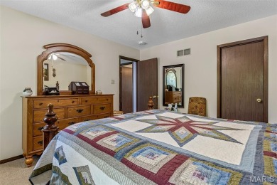 Welcome to this charming 3-bedroom, 3-bath split foyer home on Terre Du Lac Golf and Country Club in Missouri - for sale on GolfHomes.com, golf home, golf lot