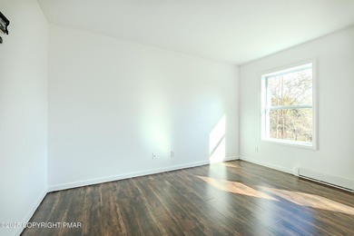 PRICE REDUCED...Welcome to your Pocono retreat! This stunning on Pocono Farms Country Club in Pennsylvania - for sale on GolfHomes.com, golf home, golf lot