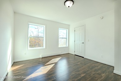 PRICE REDUCED...Welcome to your Pocono retreat! This stunning on Pocono Farms Country Club in Pennsylvania - for sale on GolfHomes.com, golf home, golf lot