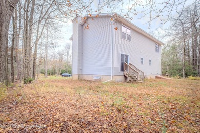 PRICE REDUCED...Welcome to your Pocono retreat! This stunning on Pocono Farms Country Club in Pennsylvania - for sale on GolfHomes.com, golf home, golf lot