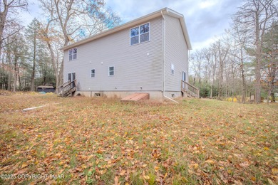PRICE REDUCED...Welcome to your Pocono retreat! This stunning on Pocono Farms Country Club in Pennsylvania - for sale on GolfHomes.com, golf home, golf lot