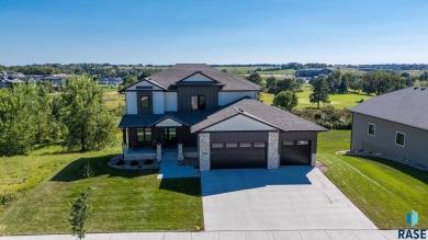 Experience luxury living in this beautiful two-story walkout on Willow Run Golf Course in South Dakota - for sale on GolfHomes.com, golf home, golf lot