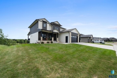Experience luxury living in this beautiful two-story walkout on Willow Run Golf Course in South Dakota - for sale on GolfHomes.com, golf home, golf lot