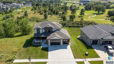Experience luxury living in this beautiful two-story walkout on Willow Run Golf Course in South Dakota - for sale on GolfHomes.com, golf home, golf lot