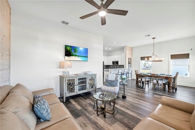 This 4-bedroom, 3-bathroom home is just a short golf cart ride on Palmilla Beach Golf Club in Texas - for sale on GolfHomes.com, golf home, golf lot