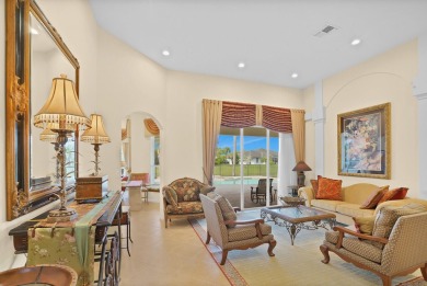 This former model home offers breathtaking lake and golf course on The Wanderers Club in Florida - for sale on GolfHomes.com, golf home, golf lot