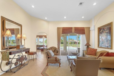 This former model home offers breathtaking lake and golf course on The Wanderers Club in Florida - for sale on GolfHomes.com, golf home, golf lot