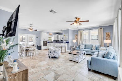 Welcome to 112 Vista Dr - Where Every Day Feels Like a Coastal on Pass Christian Isles Golf Club in Mississippi - for sale on GolfHomes.com, golf home, golf lot