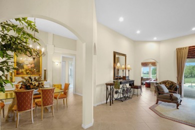 This former model home offers breathtaking lake and golf course on The Wanderers Club in Florida - for sale on GolfHomes.com, golf home, golf lot