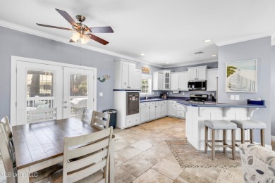 Welcome to 112 Vista Dr - Where Every Day Feels Like a Coastal on Pass Christian Isles Golf Club in Mississippi - for sale on GolfHomes.com, golf home, golf lot