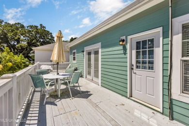 Welcome to 112 Vista Dr - Where Every Day Feels Like a Coastal on Pass Christian Isles Golf Club in Mississippi - for sale on GolfHomes.com, golf home, golf lot