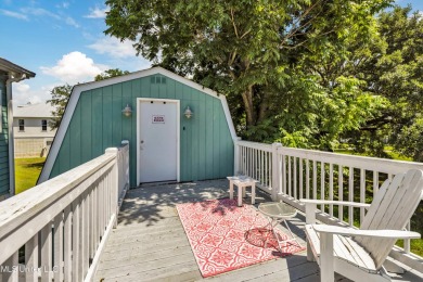 Welcome to 112 Vista Dr - Where Every Day Feels Like a Coastal on Pass Christian Isles Golf Club in Mississippi - for sale on GolfHomes.com, golf home, golf lot