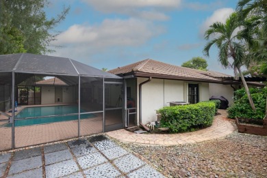 Beautifully updated & rarely available 4 bedroom 2-1/2 bath on Boca Lago Golf and Country Club in Florida - for sale on GolfHomes.com, golf home, golf lot