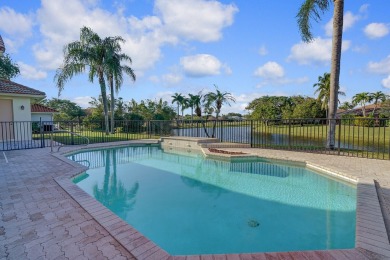 This former model home offers breathtaking lake and golf course on The Wanderers Club in Florida - for sale on GolfHomes.com, golf home, golf lot