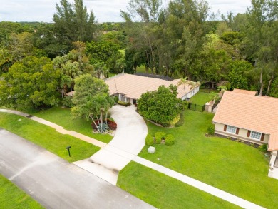 Beautifully updated & rarely available 4 bedroom 2-1/2 bath on Boca Lago Golf and Country Club in Florida - for sale on GolfHomes.com, golf home, golf lot