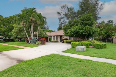 Beautifully updated & rarely available 4 bedroom 2-1/2 bath on Boca Lago Golf and Country Club in Florida - for sale on GolfHomes.com, golf home, golf lot