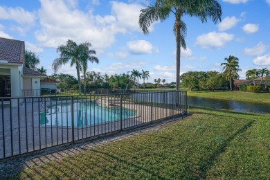 This former model home offers breathtaking lake and golf course on The Wanderers Club in Florida - for sale on GolfHomes.com, golf home, golf lot