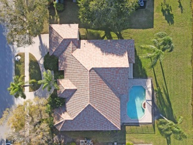 This former model home offers breathtaking lake and golf course on The Wanderers Club in Florida - for sale on GolfHomes.com, golf home, golf lot