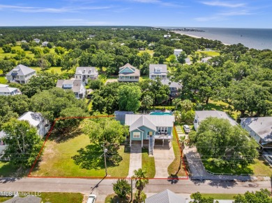 Welcome to 112 Vista Dr - Where Every Day Feels Like a Coastal on Pass Christian Isles Golf Club in Mississippi - for sale on GolfHomes.com, golf home, golf lot