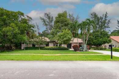 Beautifully updated & rarely available 4 bedroom 2-1/2 bath on Boca Lago Golf and Country Club in Florida - for sale on GolfHomes.com, golf home, golf lot