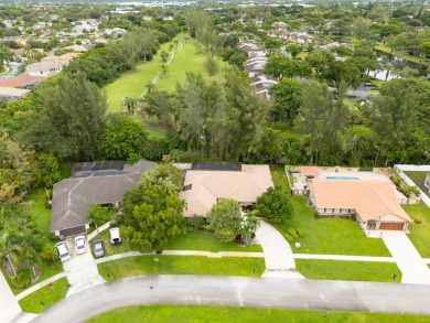 Beautifully updated & rarely available 4 bedroom 2-1/2 bath on Boca Lago Golf and Country Club in Florida - for sale on GolfHomes.com, golf home, golf lot