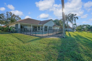 This former model home offers breathtaking lake and golf course on The Wanderers Club in Florida - for sale on GolfHomes.com, golf home, golf lot