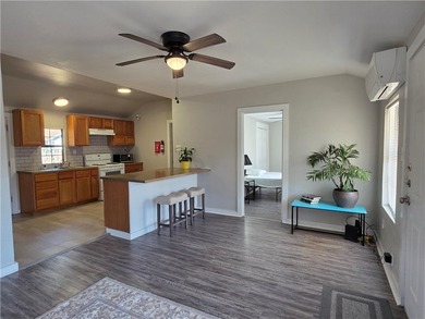 2 FURNISHED HOMES FOR THE PRICE OF 1! Fantastic investment on Rockport Country Club in Texas - for sale on GolfHomes.com, golf home, golf lot