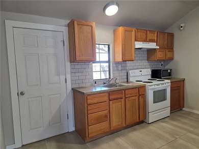 2 FURNISHED HOMES FOR THE PRICE OF 1! Fantastic investment on Rockport Country Club in Texas - for sale on GolfHomes.com, golf home, golf lot