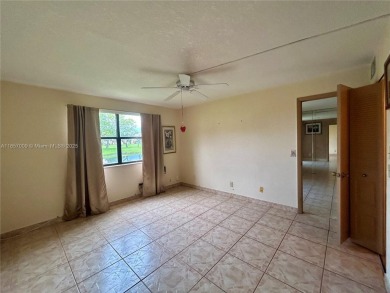 SITUATED IN SOUGHT AFTER PHASE FOUR OF SUNRISE LAKES 55+ on Sunrise Lakes Phase IV Golf Course in Florida - for sale on GolfHomes.com, golf home, golf lot