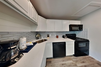 Discover the charm of this beautifully updated and fully on Sandpiper Cove Golf Course in Florida - for sale on GolfHomes.com, golf home, golf lot