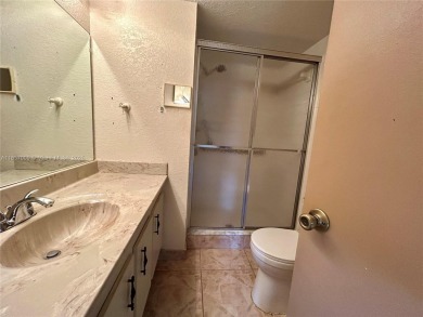 SITUATED IN SOUGHT AFTER PHASE FOUR OF SUNRISE LAKES 55+ on Sunrise Lakes Phase IV Golf Course in Florida - for sale on GolfHomes.com, golf home, golf lot