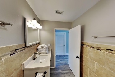Discover the charm of this beautifully updated and fully on Sandpiper Cove Golf Course in Florida - for sale on GolfHomes.com, golf home, golf lot