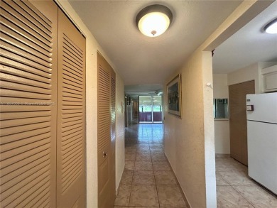 SITUATED IN SOUGHT AFTER PHASE FOUR OF SUNRISE LAKES 55+ on Sunrise Lakes Phase IV Golf Course in Florida - for sale on GolfHomes.com, golf home, golf lot